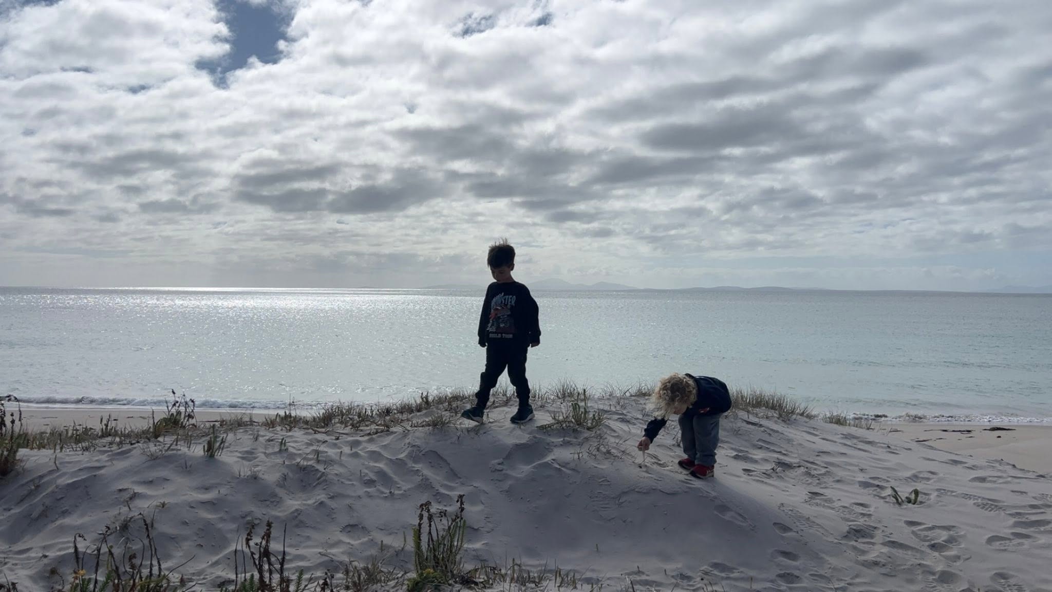 CHILDREN ON SAND DUNE